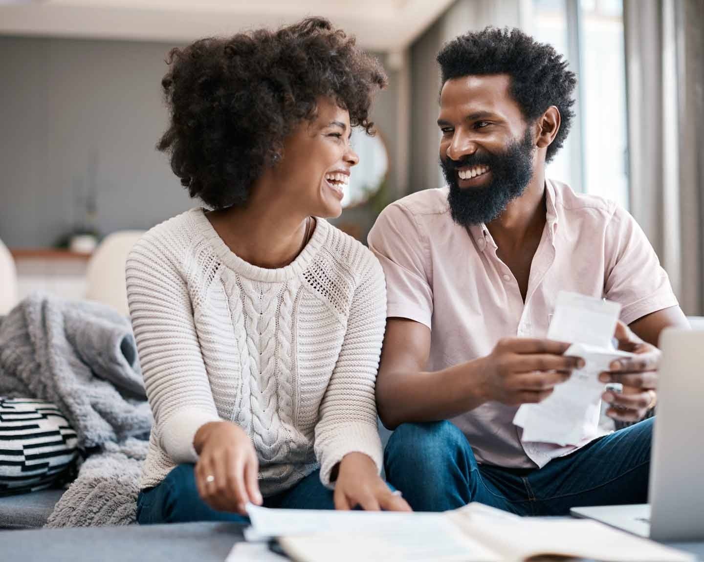 Man and woman looking at papers