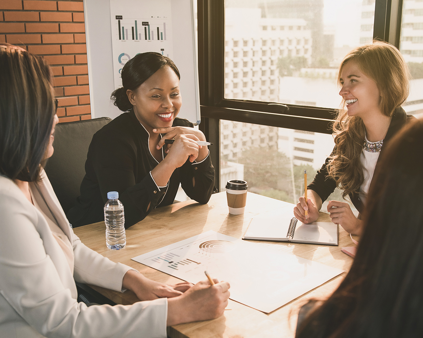 Several business women are discussing